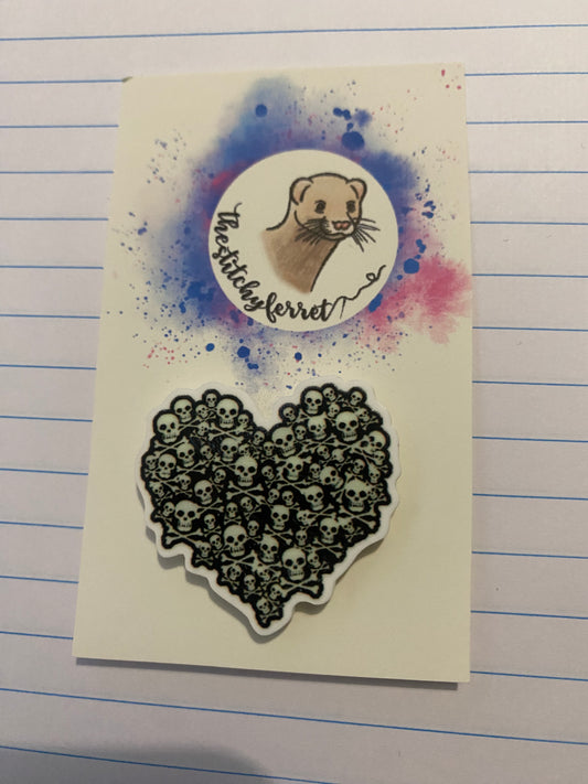 Heart of skulls needle minder